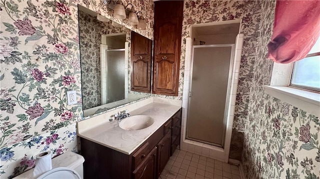 5761 Carlisle Ct, New Orleans, LA 70131 - full bath featuring wallpapered walls, tile patterned floors, vanity, and a stall shower
