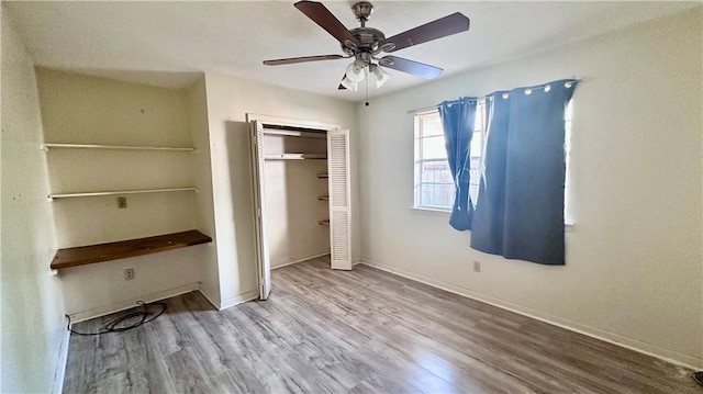 5761 Carlisle Ct, New Orleans, LA 70131 - unfurnished bedroom featuring wood finished floors, a closet, and ceiling fan