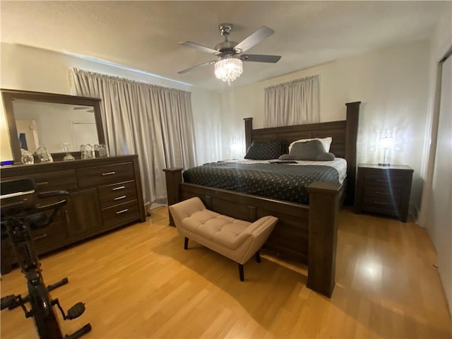 8007 Drum St, New Orleans, LA 70126 - bedroom with light wood-style floors and ceiling fan
