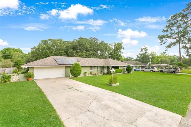 1435 Monterrey Blvd, Baton Rouge, LA 70815 - single story home with a garage, solar panels, and driveway