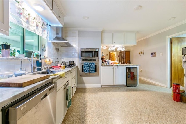 1435 Monterrey Blvd, Baton Rouge, LA 70815 - kitchen with appliances with stainless steel finishes, beverage cooler, wall chimney range hood, tasteful backsplash, and ornamental molding