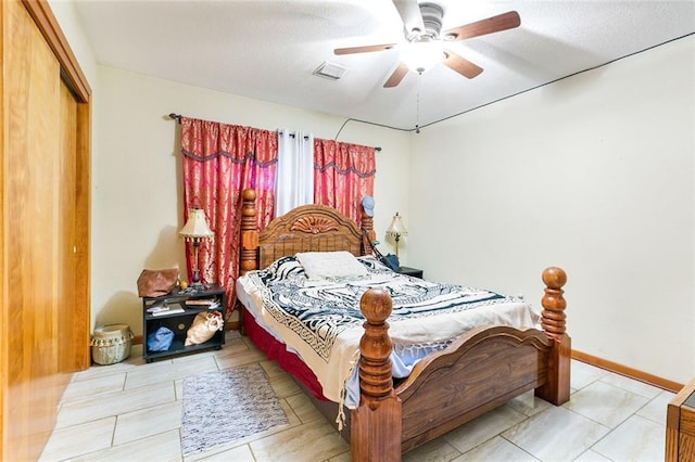 1435 Monterrey Blvd, Baton Rouge, LA 70815 - tiled bedroom with a closet and a ceiling fan