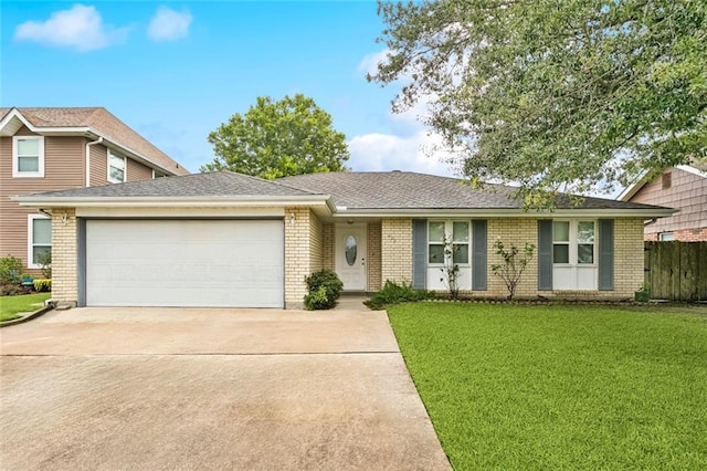 422 Eden Isles Blvd, Slidell, LA 70458 - view of front of house with brick siding, an attached garage, and concrete driveway