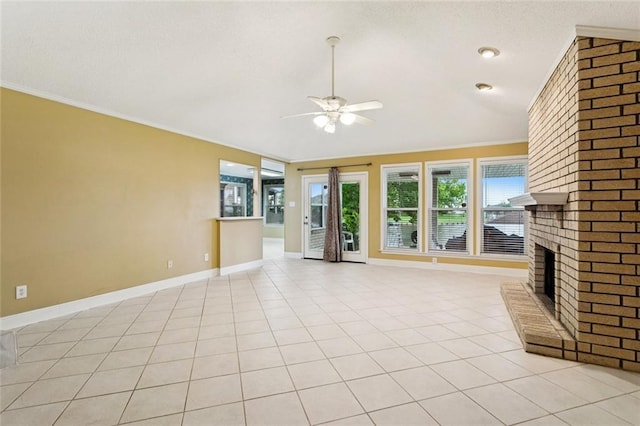 422 Eden Isles Blvd, Slidell, LA 70458 - unfurnished living room with ceiling fan, a fireplace, ornamental molding, light tile patterned floors, and a textured ceiling