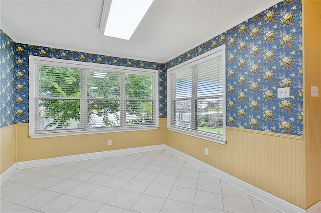422 Eden Isles Blvd, Slidell, LA 70458 - spare room featuring a wainscoted wall and wallpapered walls