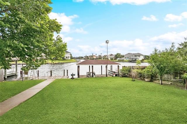 422 Eden Isles Blvd, Slidell, LA 70458 - surrounding community with a boat dock, a water view, and a residential view