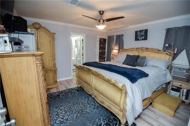 43126 Pecan Ridge Dr, Hammond, LA 70403 - bedroom featuring light wood-style floors, crown molding, cooling unit, a ceiling fan, and connected bathroom