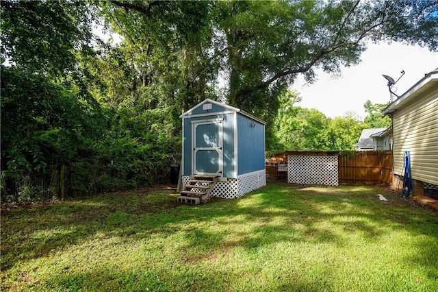 43126 Pecan Ridge Dr, Hammond, LA 70403 - view of yard featuring a storage unit and entry steps