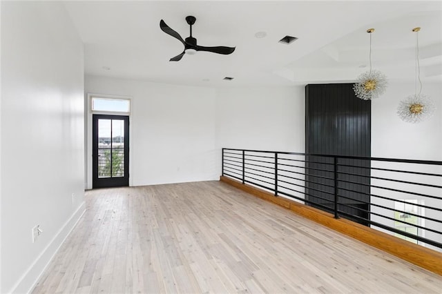 5651 W End Blvd, New Orleans, LA 70124 - unfurnished room featuring a ceiling fan and wood finished floors
