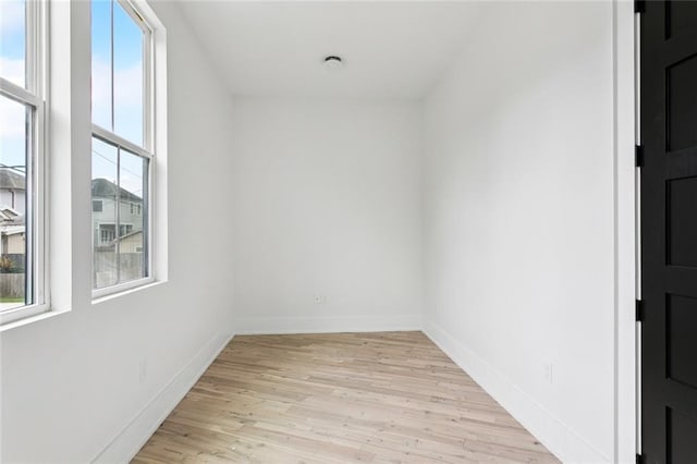 5651 W End Blvd, New Orleans, LA 70124 - empty room with light wood-style floors and baseboards
