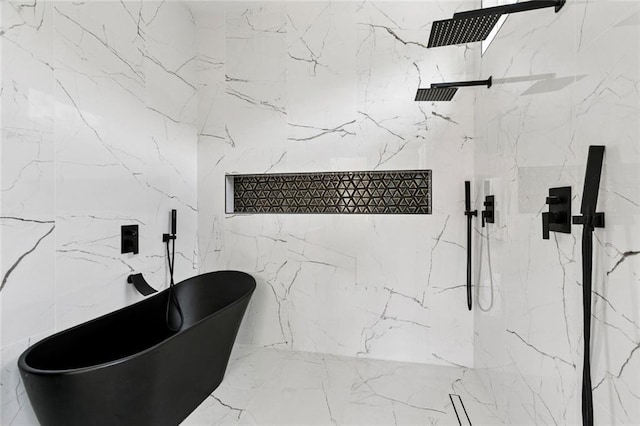 5651 W End Blvd, New Orleans, LA 70124 - bathroom featuring a freestanding tub and a marble finish shower