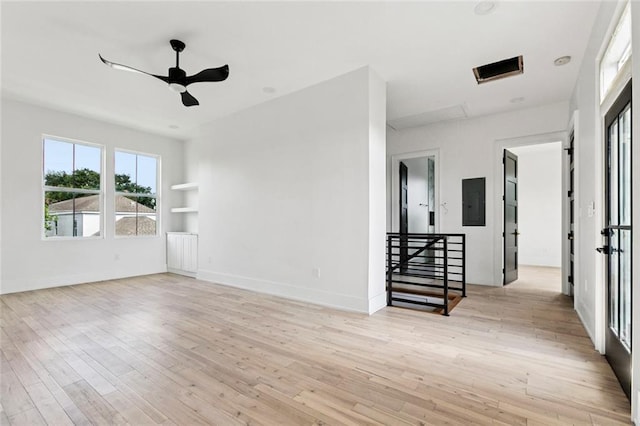 5651 W End Blvd, New Orleans, LA 70124 - empty room with electric panel, light wood-type flooring, ceiling fan, and a smoke detector
