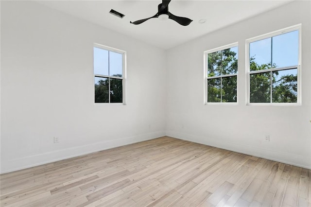 5651 W End Blvd, New Orleans, LA 70124 - unfurnished room featuring healthy amount of natural light, light wood-style flooring, and ceiling fan