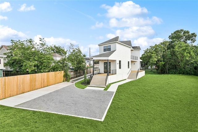 5651 W End Blvd, New Orleans, LA 70124 - back of house with a porch