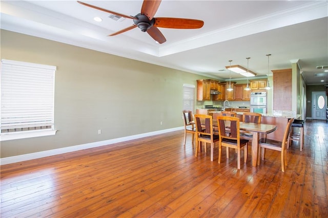 121 Pontchartrain Rd, La Place, LA 70068 - dining area featuring crown molding, a ceiling fan, dark wood-style flooring, and recessed lighting