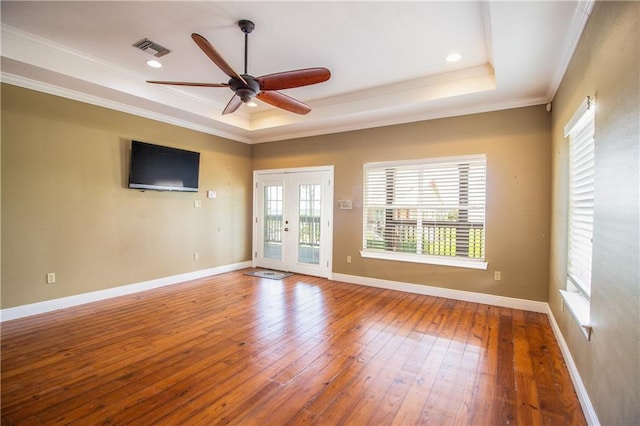121 Pontchartrain Rd, La Place, LA 70068 - empty room with a raised ceiling, crown molding, hardwood / wood-style floors, a ceiling fan, and recessed lighting