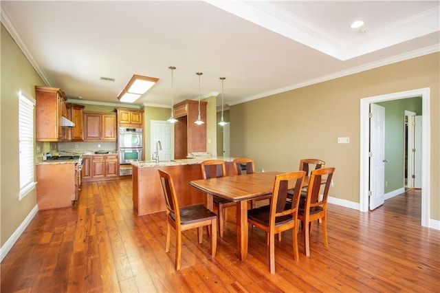 121 Pontchartrain Rd, La Place, LA 70068 - dining space featuring hardwood / wood-style flooring and ornamental molding