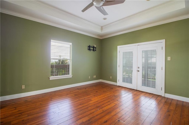 121 Pontchartrain Rd, La Place, LA 70068 - unfurnished room with french doors, hardwood / wood-style floors, ceiling fan, a raised ceiling, and ornamental molding