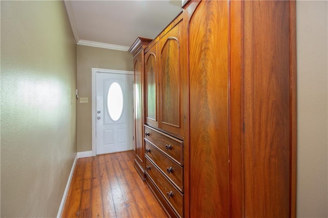 121 Pontchartrain Rd, La Place, LA 70068 - doorway to outside featuring ornamental molding and hardwood / wood-style flooring