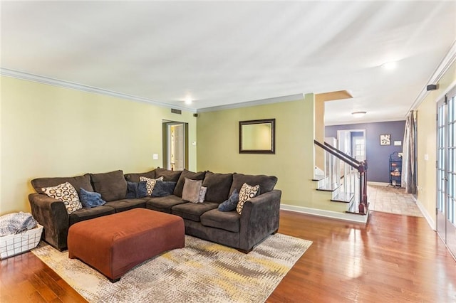 314 Royal Dr, Slidell, LA 70460 - living area featuring crown molding, stairs, and wood finished floors