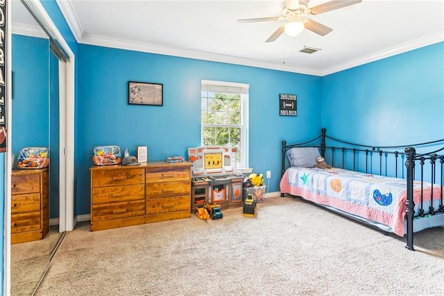 314 Royal Dr, Slidell, LA 70460 - carpeted bedroom with crown molding, a closet, and ceiling fan