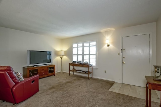 2708 Whitney Pl Unit 901, Metairie, LA 70002 - carpeted living room with baseboards