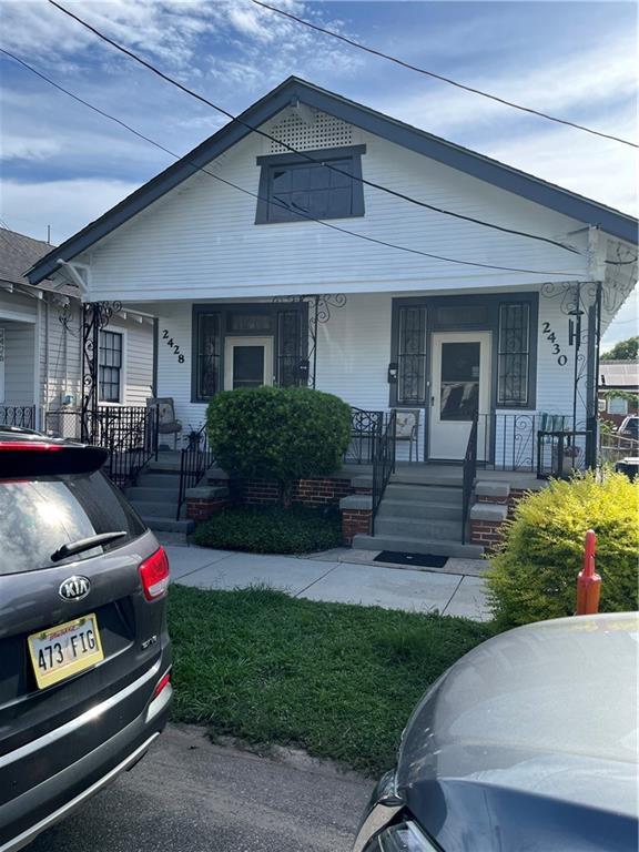 242830 A P Tureaud Ave, New Orleans, LA 70119 - shotgun-style home with a porch