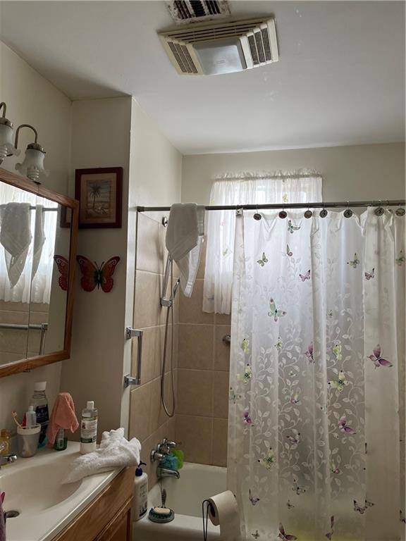 242830 A P Tureaud Ave, New Orleans, LA 70119 - bathroom with vanity and shower / bath combo