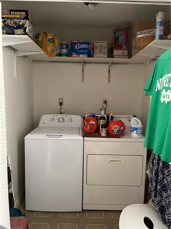 242830 A P Tureaud Ave, New Orleans, LA 70119 - washroom featuring separate washer and dryer