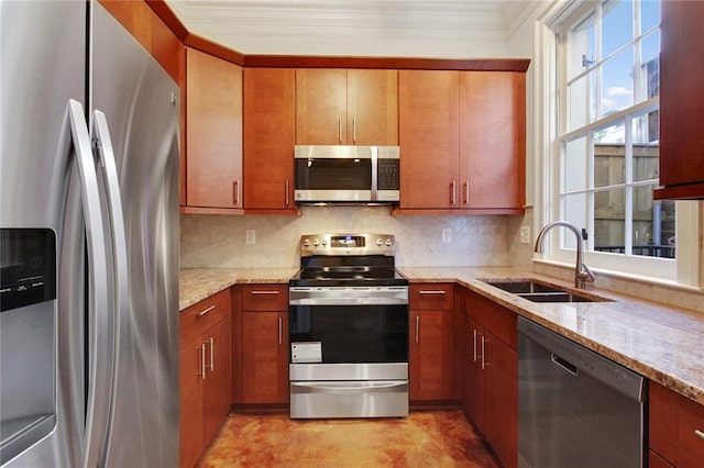 826 Touro St Unit 4, New Orleans, LA 70116 - kitchen featuring appliances with stainless steel finishes, crown molding, plenty of natural light, light stone counters, and decorative backsplash