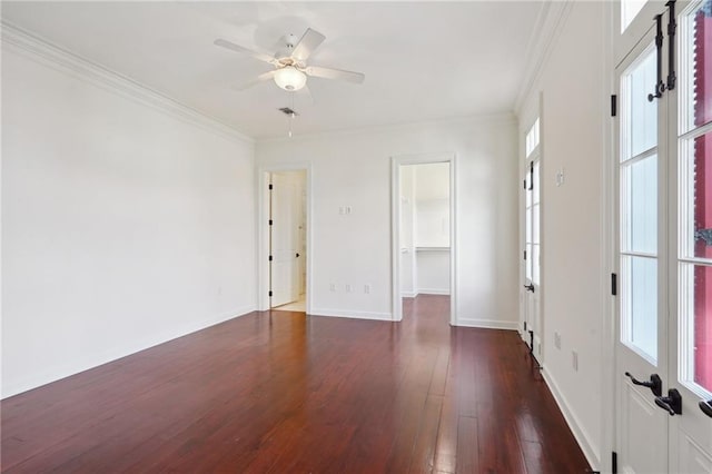 826 Touro St Unit 4, New Orleans, LA 70116 - spare room with dark wood finished floors, ornamental molding, and a ceiling fan