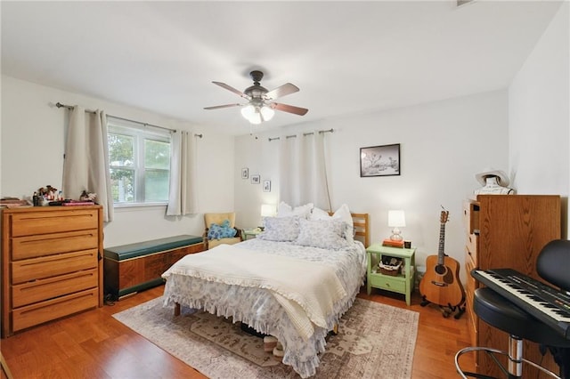 685759 Vicksburg St, New Orleans, LA 70124 - bedroom with light wood-style flooring and a ceiling fan
