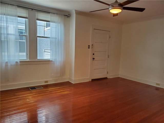 411 Lowerline St Unit D, New Orleans, LA 70118 - spare room with wood finished floors, healthy amount of natural light, and a ceiling fan