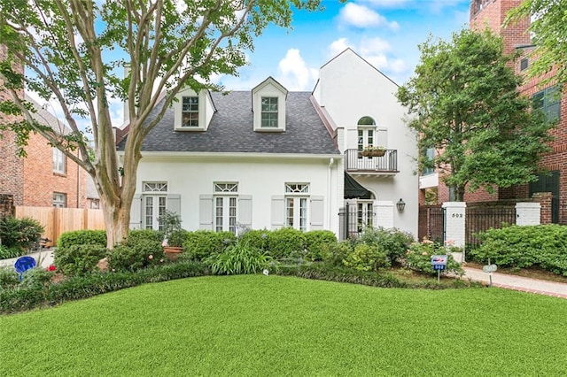 502 Hector Ave, Metairie, LA 70005 - view of front facade featuring stucco siding and a shingled roof