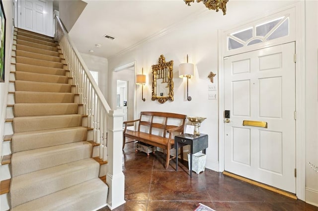 502 Hector Ave, Metairie, LA 70005 - entryway with stairs and crown molding