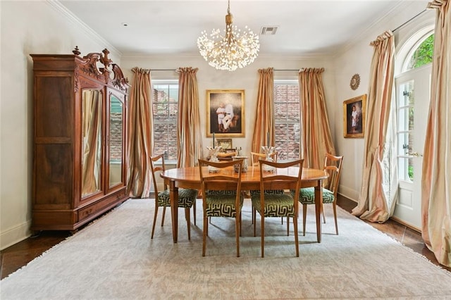 502 Hector Ave, Metairie, LA 70005 - dining space with a chandelier and ornamental molding