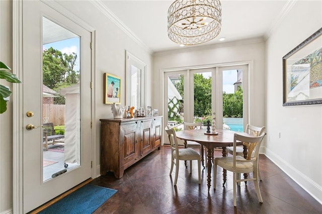 502 Hector Ave, Metairie, LA 70005 - dining space featuring a chandelier, ornamental molding, and french doors