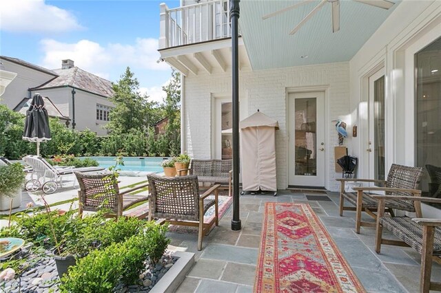 502 Hector Ave, Metairie, LA 70005 - patio / terrace featuring a ceiling fan, a patio area, and a swimming pool