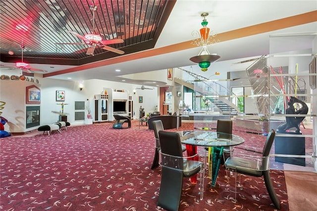 738 English Turn Ln, New Orleans, LA 70131 - carpeted dining space featuring a ceiling fan and stairway