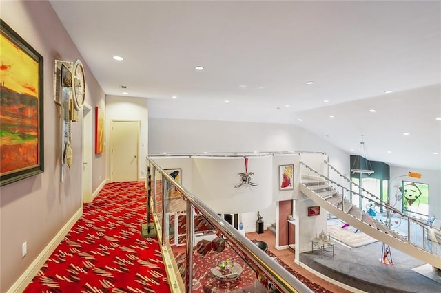738 English Turn Ln, New Orleans, LA 70131 - hall with carpet flooring, an upstairs landing, recessed lighting, and vaulted ceiling