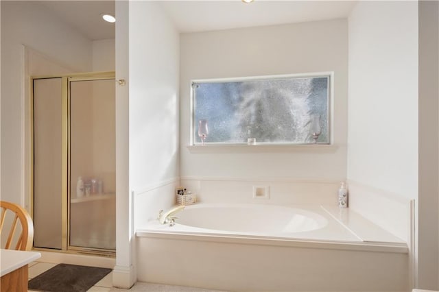 1071 Rue Chinon, Mandeville, LA 70471 - bathroom featuring a shower stall, a garden tub, vanity, and recessed lighting