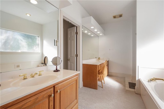 1071 Rue Chinon, Mandeville, LA 70471 - full bathroom featuring vanity, a garden tub, and recessed lighting