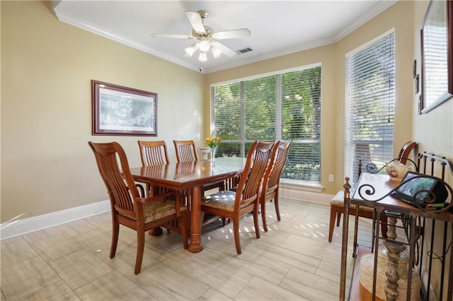 1071 Rue Chinon, Mandeville, LA 70471 - dining area featuring ornamental molding, healthy amount of natural light, and ceiling fan