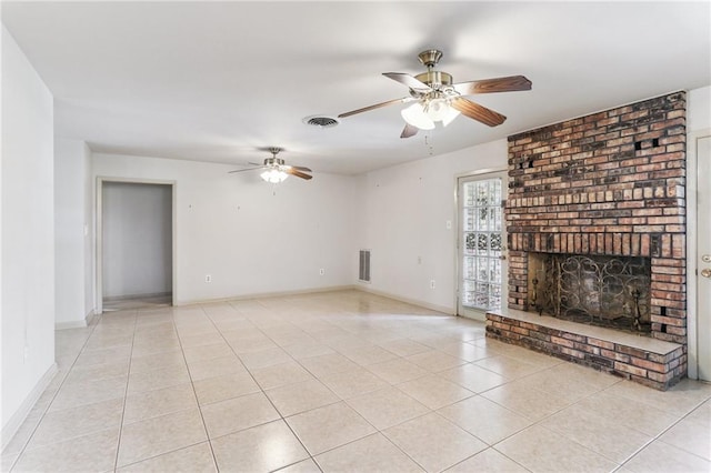 142 E Randall Ct, Gretna, LA 70053 - unfurnished living room featuring ceiling fan, light tile patterned floors, and a brick fireplace