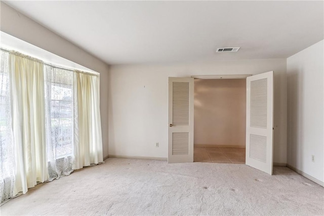 142 E Randall Ct, Gretna, LA 70053 - unfurnished bedroom featuring carpet floors and baseboards