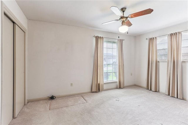 142 E Randall Ct, Gretna, LA 70053 - unfurnished bedroom with light colored carpet and ceiling fan