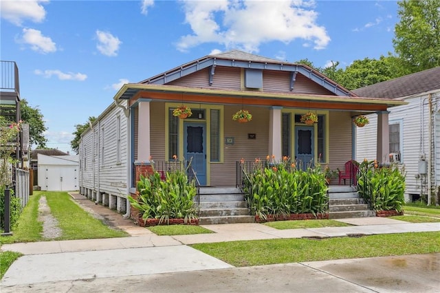 53941 Angela St, Arabi, LA 70032 - view of front facade with covered porch