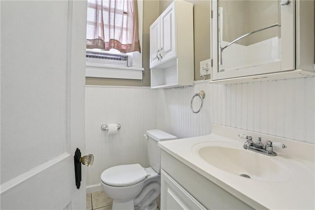 53941 Angela St, Arabi, LA 70032 - bathroom with vanity, a wainscoted wall, tile patterned flooring, and a shower