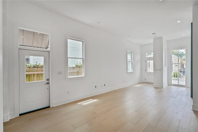 5310 Laurel St, New Orleans, LA 70115 - foyer with light wood-style flooring and recessed lighting