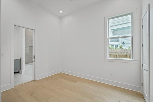 5310 Laurel St, New Orleans, LA 70115 - unfurnished bedroom featuring light wood finished floors, recessed lighting, and ensuite bathroom